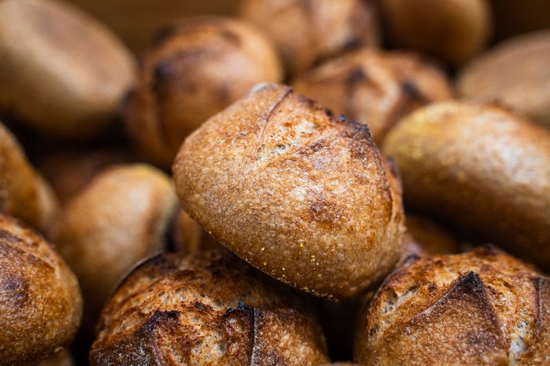 Artisan bread roll served warm with butter